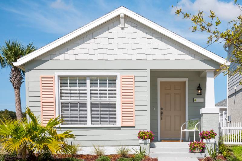 Front view of a house, representing strategies to pay off your mortgage early and save on interest.