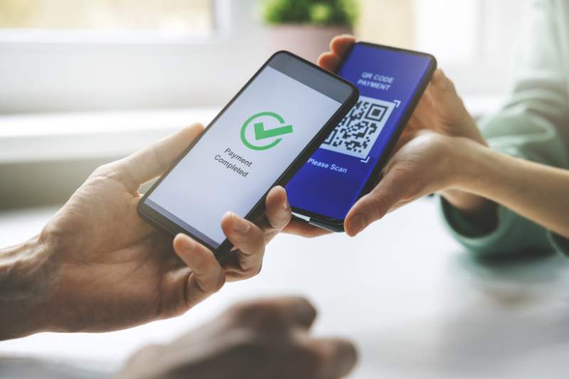 Phones showing money transfer