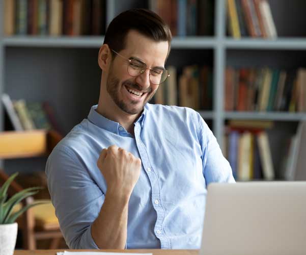 man happy about fast easy tax filing